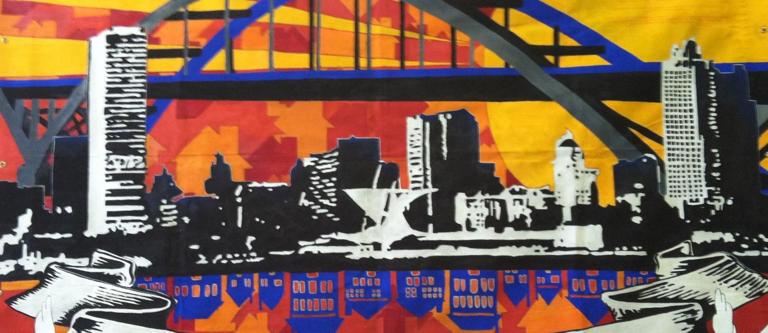 Community mural with a view of downtown Milwaukee
