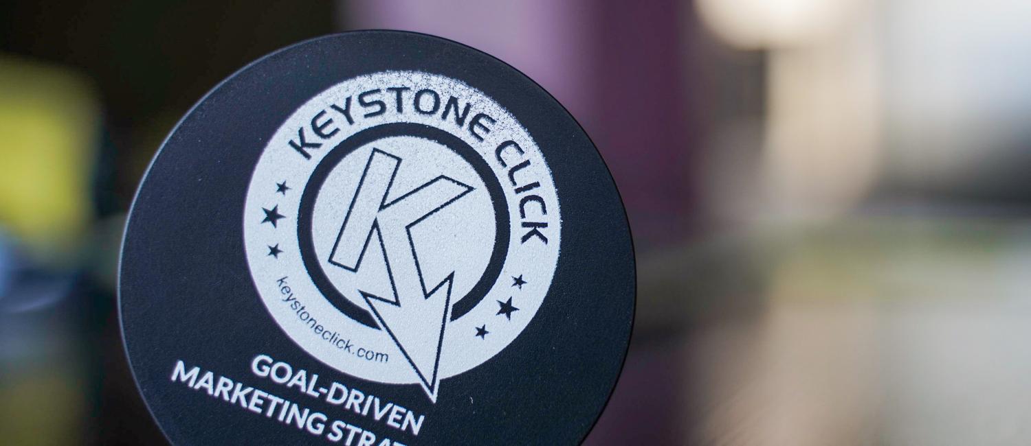 Keystone Click branded hockey puck